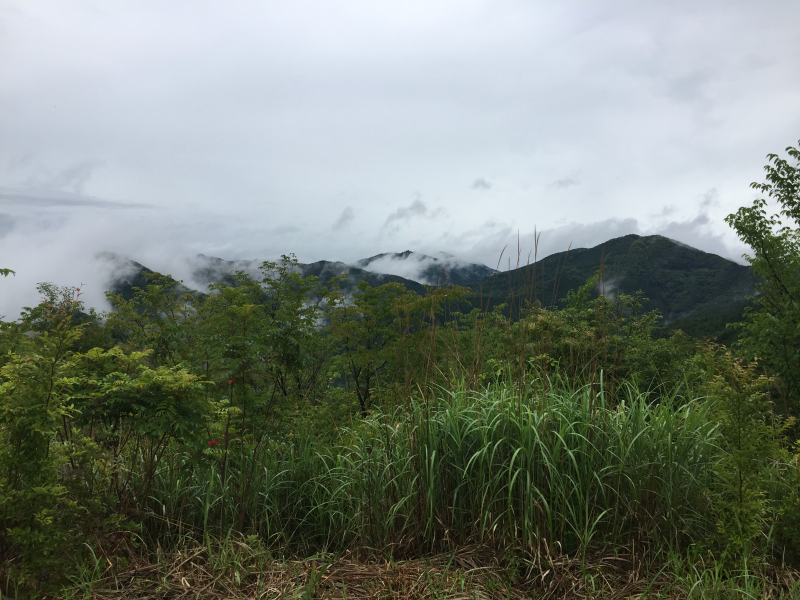 Mountains with clouds rolling through valleys