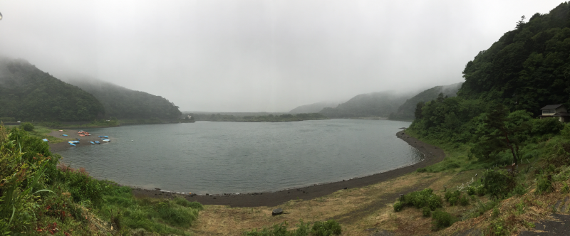 Panoramic view of lake on overcast evening
